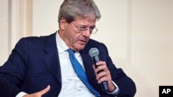 Єврокомісар з питань економіки Паоло Джентілоні. AP Photo/Andres Kudacki