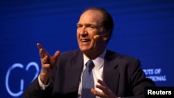 FILE - David Malpass, under secretary for international affairs at the U.S. Department of the Treasury, gestures during a 2018 G-20 conference in Buenos Aires, Argentina, March 18, 2018.