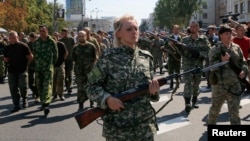 Pro-Russian Separatists March Ukrainian POWs Through Donetsk
