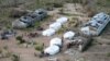 Tents belonging to aid organizations are seen after Cyclone Idai at Guara Guara village outside Beira, Mozambique, March 22, 2019. 