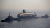 India's third Scorpene-class submarine INS Karanj is seen as a tugboat pulls it during its launch at the Mazagon Dock Ltd. naval shipbuilding yard, in Mumbai, India January 31, 2018.