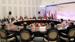 Para peserta pembicaraan terkait nuklir Iran di Kazakhstan, 26 Februari 2013. (AP Photo/ Stanislav Filippov, pool)