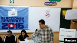 A man casts his ballot in Peru's presidential election at a voting station in Lima, Peru, June 5, 2016. 