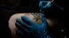 Hong Kong Protesters Use Tattoos to Support Movement