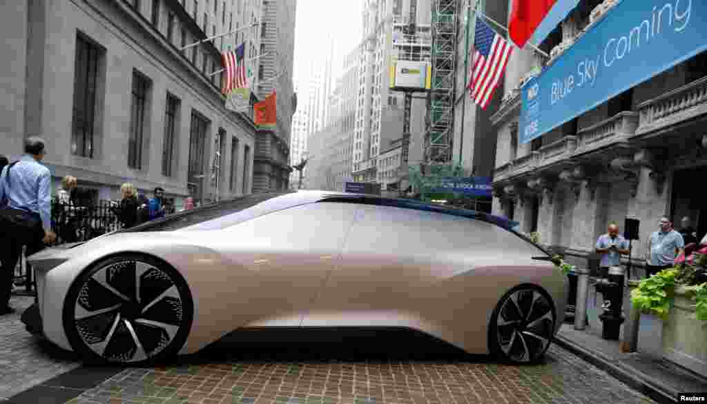 Chinese electric vehicle start-up NIO Inc. showcases one its cars in front of the New York Stock Exchange (NYSE) to celebrate the company’s initial public offering (IPO) in New York.