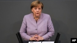 German Chancellor Angela Merkel delivers her speech about the European Union at the German parliament Bundestag in Berlin, April 27, 2017. 