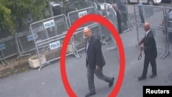 A still image taken from CCTV video and obtained by TRT World claims to show Saudi journalist Jamal Khashoggi, highlighted in a red circle by the source, as he arrives at Saudi Arabia's Consulate in Istanbul, Turkey, Oct. 2, 2018. 