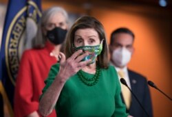 FILE - Speaker of the House Nancy Pelosi, D-Calif., speaks during a news conference at the Capitol, Feb. 26, 2021.