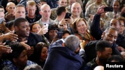 President Barack Obama shakes hands after addressing troops at Joint Base McGuire-Dix-Lakehurst, in New Jersey, Dec. 15, 2014.