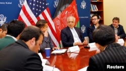 FILE - U.S. special envoy for peace in Afghanistan, Zalmay Khalilzad, center, speaks during a discussion with Afghan media at the U.S Embassy in Kabul, Afghanistan Jan. 28, 2019. 