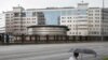 FILE - A man walks past the building of the Main Directorate of the General Staff of the Armed Forces of Russia, also know as Russian military intelligence service in Moscow, Russia. 