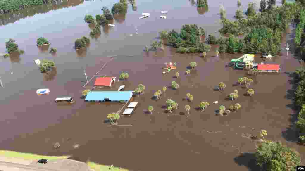 Photography by VOA's Celia Mendoza. Helicopter flight - courtesy Texas Army National Guard.
