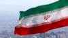 FILE - Bendera nasional Iran berkibar di Teheran, Iran, 31 Maret 2020. (AP/Vahid Salemi)