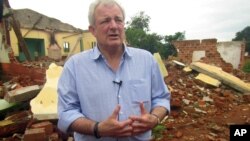 U.N. humanitarian chief Stephen O'Brien answers reporters' questions during an organized trip to Bangassou, Central African Republic, July 18, 2017.