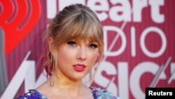 La cantante Taylor Swift llega a los iHeartRadio Music Awards en Los Ángeles, California, EE. UU., 14 de marzo de 2019. REUTERS / Mario Anzuoni.