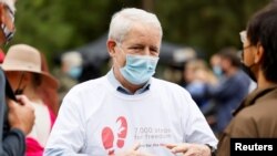 加拿大外長加諾(Marc Garneau)2021年9月5日在渥太華參加集會爭取斯帕弗和康明凱獲釋。（路透社）