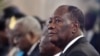 Le président ivoirien Alassane Ouattara lors de la cérémonie des voeux, à Abidjan, le 4 janvier 2018. AFP PHOTO / SIA KAMBOU