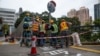 Distrik Kelas Pekerja Hong Kong Terguncang Saat COVID Merajalela