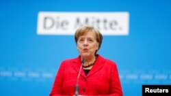 German Chancellor Angela Merkel gives a statement at the Christian Democratic Union (CDU) headquarters in Berlin, Germany, March 5, 2018.