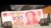 中國貨幣貶值衝擊市場