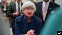 Federal Reserve Chair Janet Yellen speaks to a student at a job training center in Cleveland, Ohio, Sept. 26, 2017.