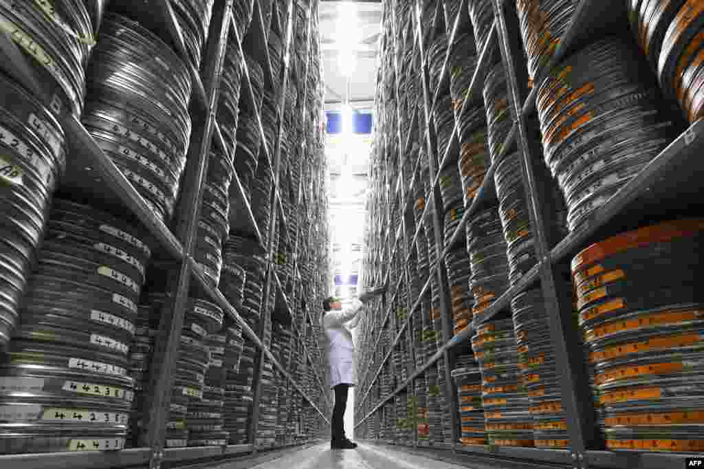 Kirsty Shanks, a film conservation specialist, takes a film can out of the storage archives at the British Film Institute (BFI) in Berkhampsted, north of London. Sherlock Holmes fans are promised a most authentic depiction of the fictional detective, with the restoration of a century-old silent film series chronicling the London sleuth's adventures.