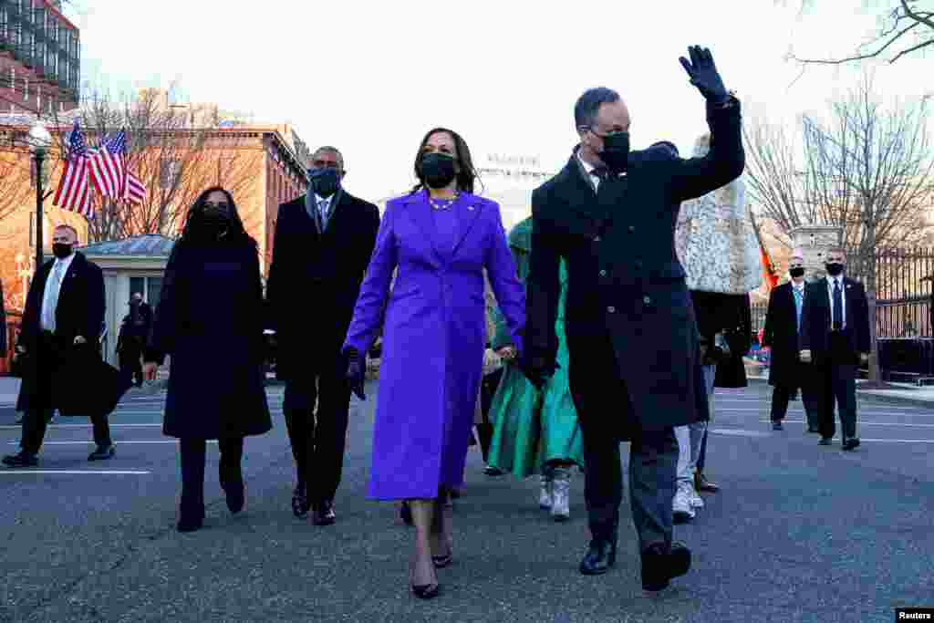 U.S. Vice President Kamala Harris and her husband Douglas Emhoff walk during the Inauguration Day parade for U.S. President Joe Biden, in Washington, January 20, 2021.