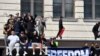 Australian Police Warn of Mass Arrests if Anti-Lockdown Protesters Return to Sydney 