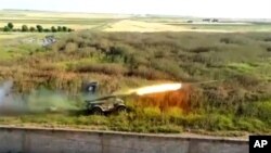 A rocket fired by Syrian rebels at Mannagh air base in Aleppo province, Syria, May 13, 2013 (Ugarit News)