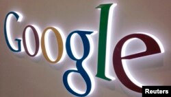 A Google sign is seen at a Best Buy electronics store in Encinitas, California, Apr. 11, 2013.