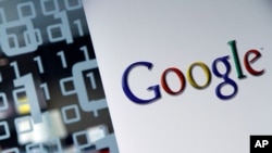 FILE - The Google logo is seen at the Google headquarters in Brussels, Belgium, March 23, 2010.