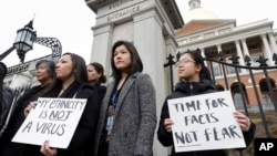 Warga AS sebagian besar keturunan Asia melakukan unjuk rasa menentang lonjakan serangan terhadap warga Amerika keturunan Asia (foto: dok). 