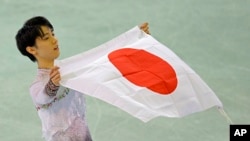 在索契冬奧會星期五的比賽中，日本選手羽生結弦為亞洲男子奪得奧運歷史上第一枚花式滑冰金牌。