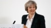 Britain’s May Lays Out Plan for Hard Brexit