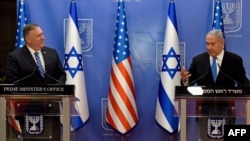 US Secretary of State Mike Pompeo, left, and Israeli Prime Minister Benjamin Netanyahu make a joint statement to the press after meeting in Jerusalem, on Aug. 24, 2020.