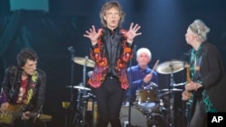 From left, Ronnie Wood, Mick Jagger, Charlie Watts and Keith Richards of the Rolling Stones perform during their 'No Filter' Europe Tour 2017 stop at U Arena in Nanterre, outside Paris, Oct. 22, 2017. 