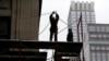 US Adds Modest 164,000 Jobs; Unemployment Down 