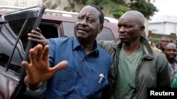 FILE - Kenyan opposition leader Raila Odinga, of the National Super Alliance (NASA) coalition, arrives at the St. Stephen's cathedral for a church service in Nairobi, Kenya, Sept. 3, 2017. 