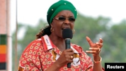 Zimbabwe's First Lady Grace Mugabe addresses her maiden political rally in Chinhoyi after she was nominated to head the Zanu PF ruling party women's league two months ago, Oct. 2, 2014. 