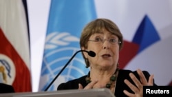 FILE - U.N. High Commissioner for Human Rights Michelle Bachelet gives a speach during a forum on women of African descent in San Jose, Dec. 3, 2019. 