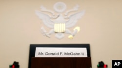 A placard is displayed for former White House Counsel Don McGahn, who did not appear before a House Judiciary Committee hearing, May 21, 2019, on Capitol Hill in Washington.