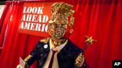 A statue of former President Donald Trump is displayed at the merchandise show at the Conservative Political Action Conference, Feb. 26, 2021, in Orlando, Fla. 