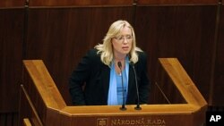 Slovakia's Prime Minister Iveta Radicova holds a speech during a Parliament session during which the lawmakers will vote on the approval for more money for the EU bailout fund in Bratislava, Slovakia, October 11, 2011.
