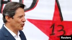 Brazil's Workers Party (PT) presidential candidate Fernando Haddad leaves the Federal Police headquarters, where Brazilian former President Luiz Inacio Lula da Silva is imprisoned, after visiting him in Curitiba, Brazil Sept. 17, 2018.