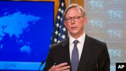FILE - Brian Hook, special representative for Iran, speaks about the creation of the Iran Action Group at the State Department, in Washington, Aug. 16, 2018.