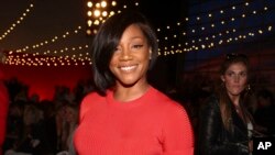 FILE - Tiffany Haddish attends the NYFW Spring/Summer 2019 Brandon Maxwell fashion show at Classic Car Club Manhattan in New York, Sept. 8, 2018. Tiffany Haddish is continuing her hot streak, winning an Emmy Award in her first try.