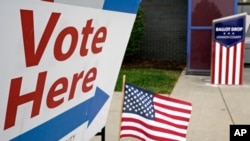 FILE - A voting location is shown in Mission, Kan., October 20, 2020.