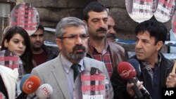 Tahir Elci, the head of Diyarbakir Bar Association, speaks to the media shortly before being shot and killed in Diyarbakir, Turkey, Nov. 28, 2015. 