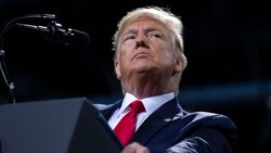 FILE - President Donald Trump speaks during a campaign rally at Kellogg Arena, in Battle Creek, Mich., Dec. 18, 2019.