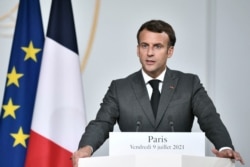 French President Emmanuel Macron speaks during a press conference at the Elysee Presidential Palace, in Paris, July 9, 2021.